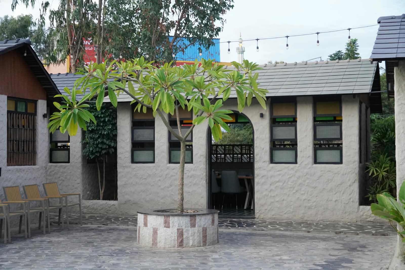 Eden Huts tranquil courtyard and private cottages